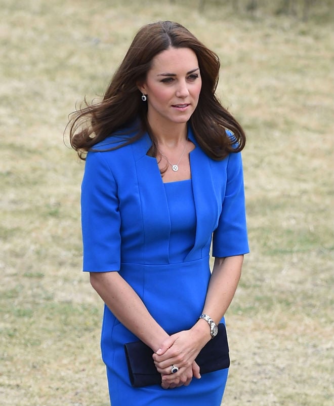 Kate held her clutch in front of her belly in all the photos. Photo: FameFlynetUK/FameFlynet