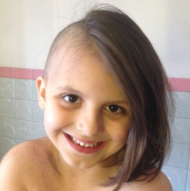 Aellyn with half her head shaved. Photo paige Lucas-Stannard