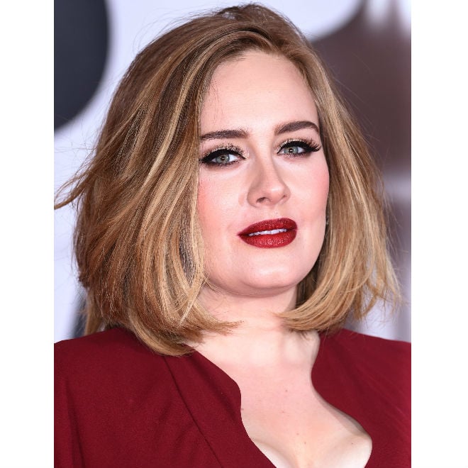 Photo of Adele in a red dress