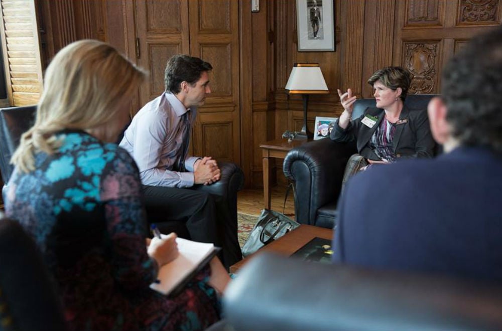 Alison talking to Prime Minister Justin Trudea. Photo courtesy of the parliament