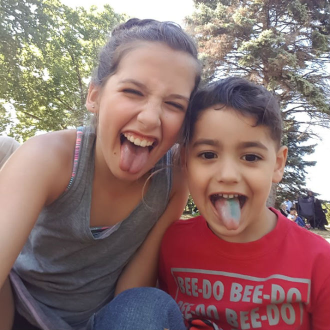 Emma's daughter and Ahmad taking a silly selfie. Photo: Emma Waverman