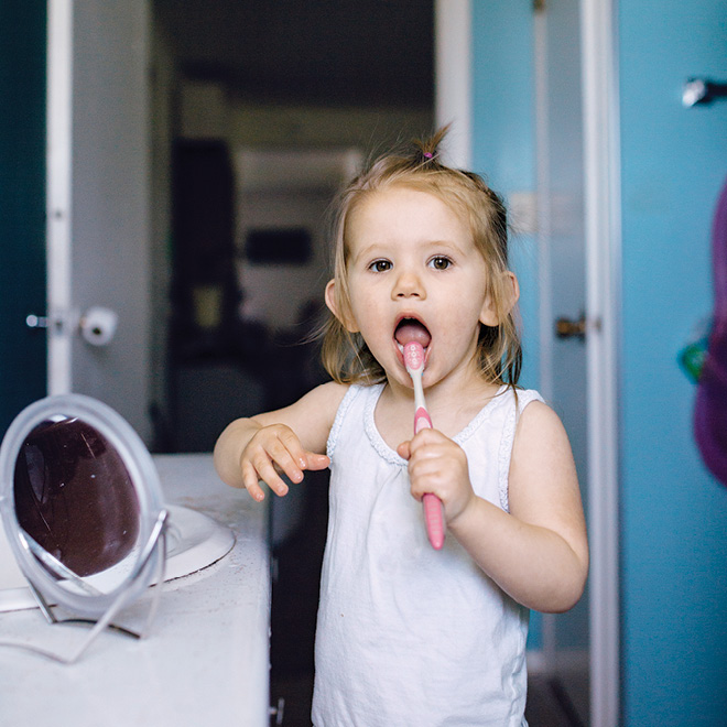 How to brush your toddler’s teeth when she’s not into it