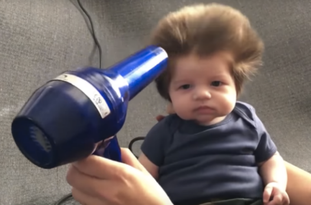 7 cute babies with lots of hair