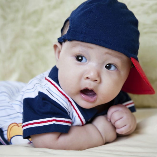 sporty baby wearing baseball cap