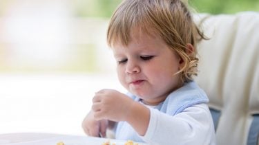 Baby-led weaning: Toddler eating scrambled eggs