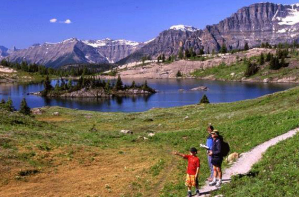 family on a hike through the Rocky Mountains