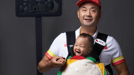 Dad and baby dressed as a burger and fast food worker