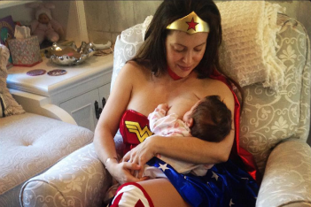  Image of Alyssa Milano breastfeeding her baby while dressed as wonder woman