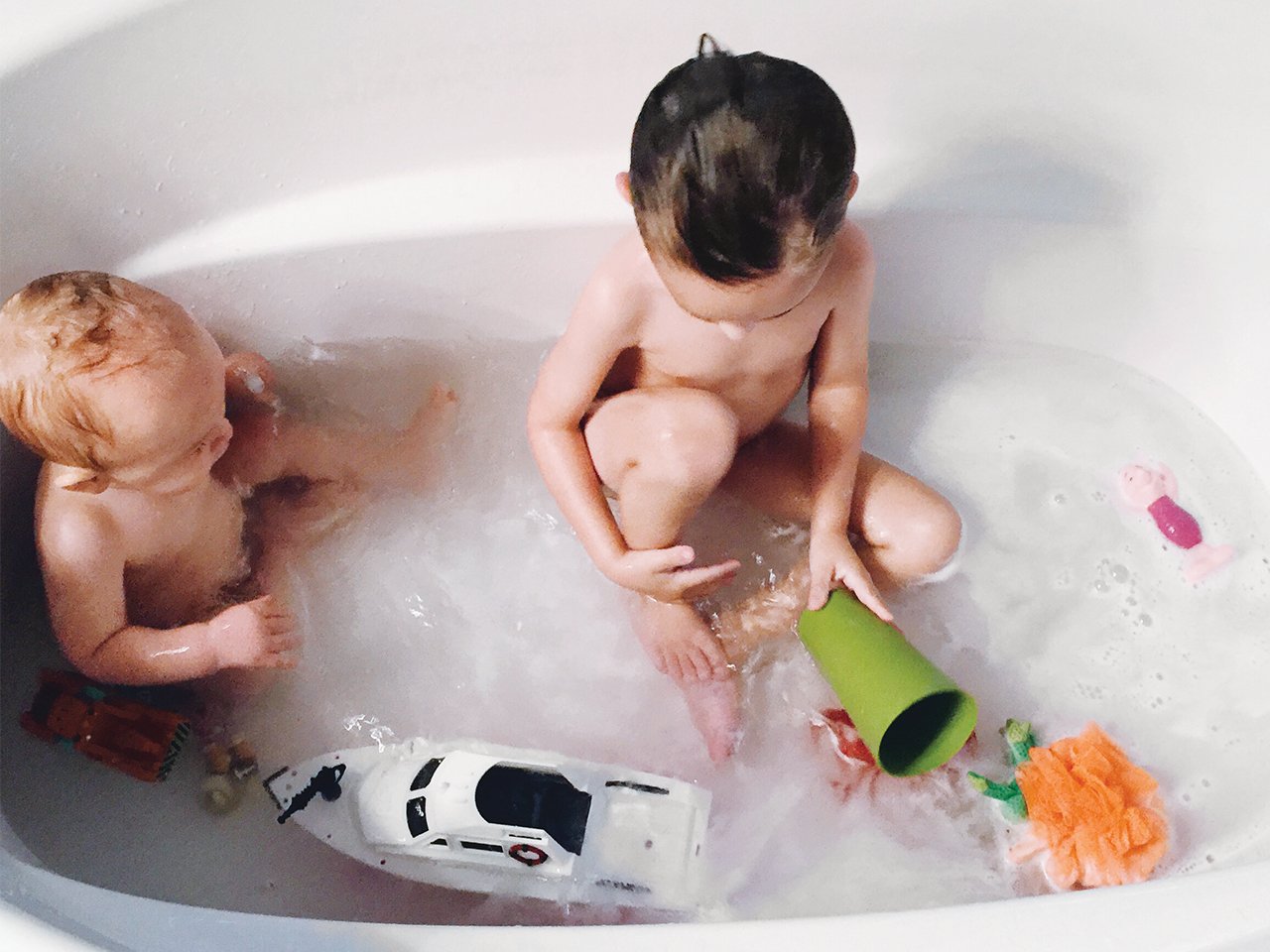 toddlers in bath