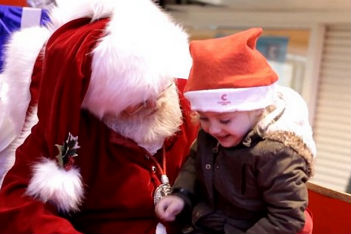 Santa uses sign language to find out what little girl wants for Christmas