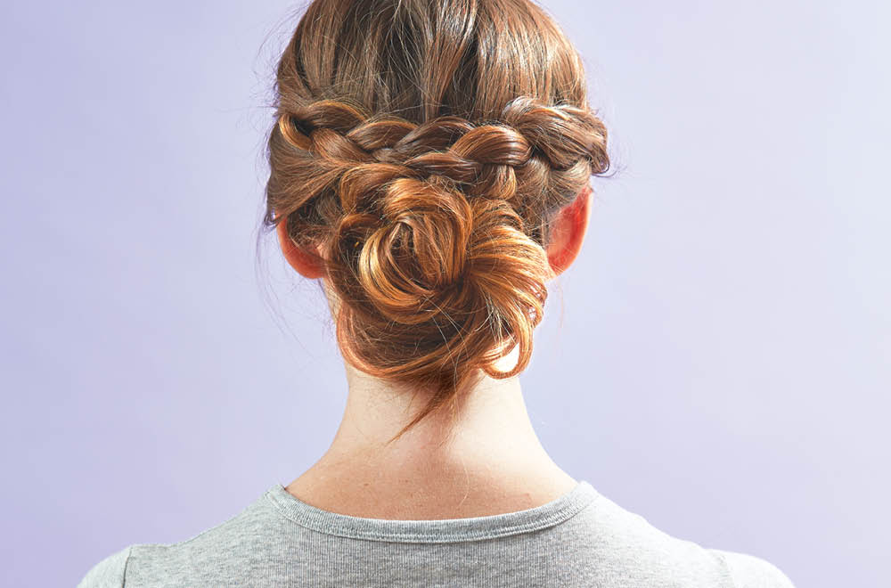 Messy knotted bun with braids