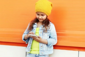 tween girl on a cell phone