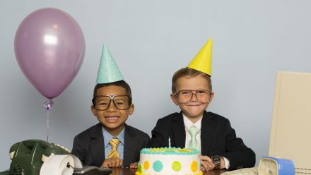 Kids in birthday hats