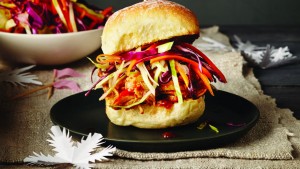 a bun with pulled pork and slaw