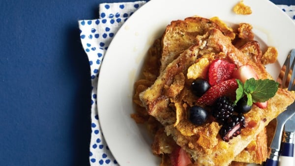 plate of French toast with fresh fruit