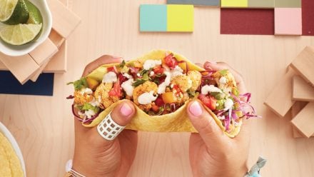 hands holding a taco