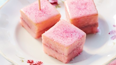 small pink cakes on pretty china plate