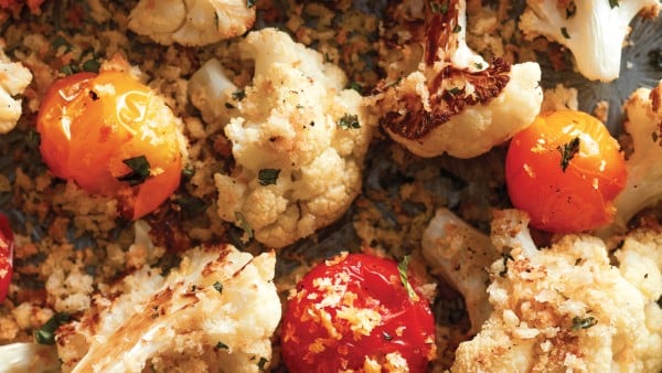 tray of roasted cauliflower and tomatoes