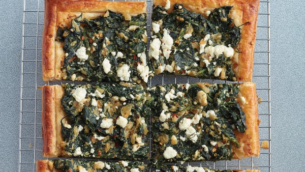 Puff pastry pizza with spinach and cheese