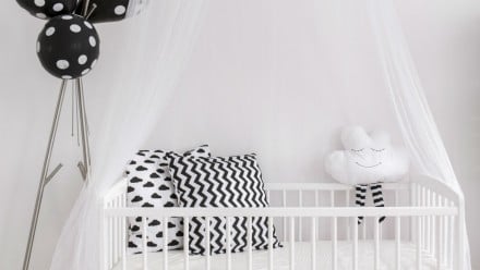 Modern black and white baby crib and decor