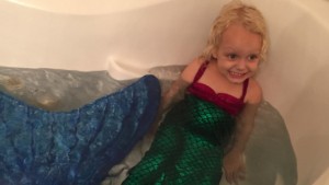 Little girl in mermaid costume