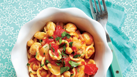 bowl of pasta with tomatoes and chickpeas