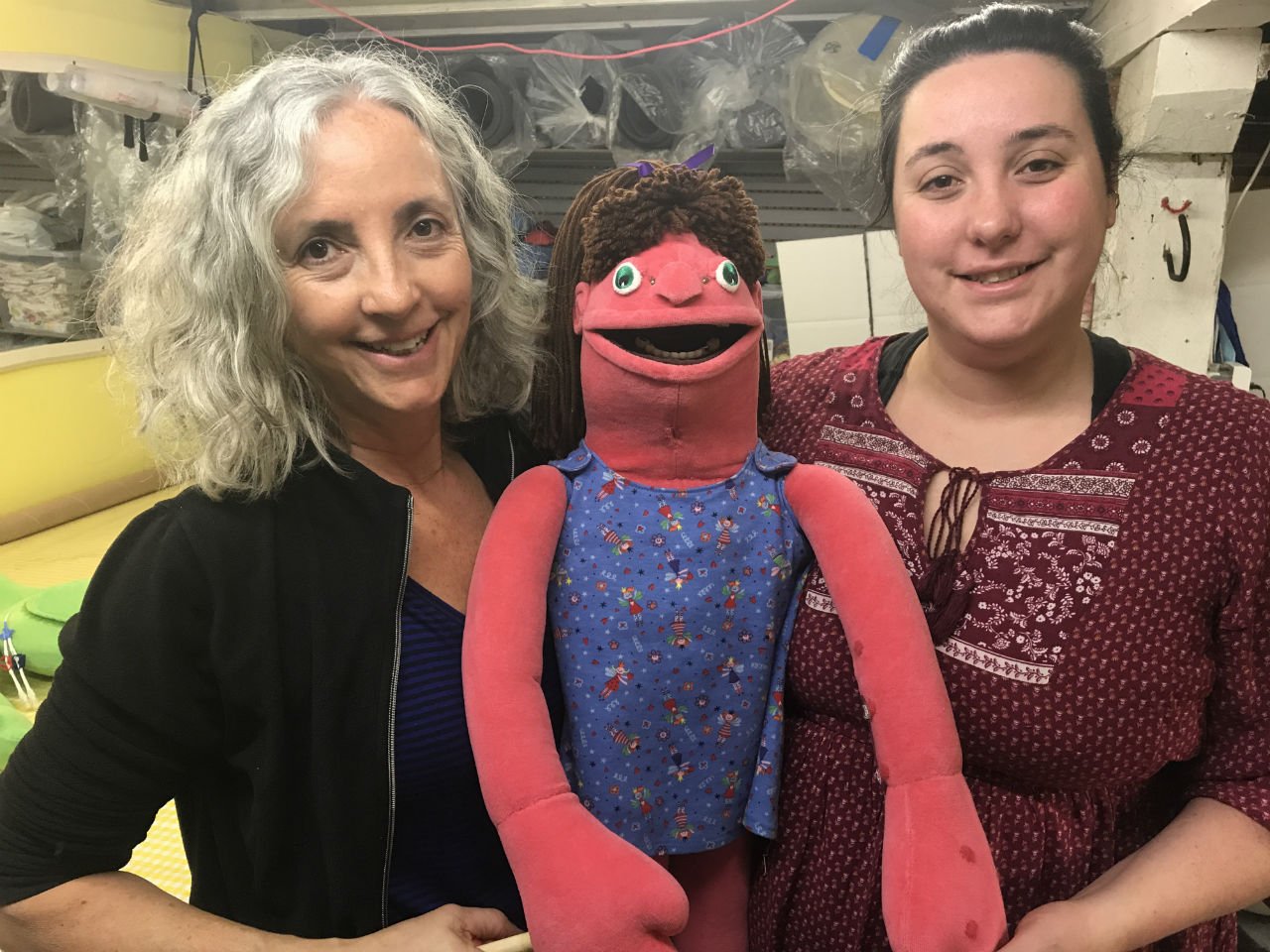 Patient Puppets founders with a puppet
