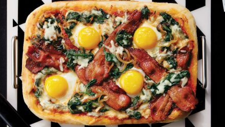 pizza with bacon and fried egg on top