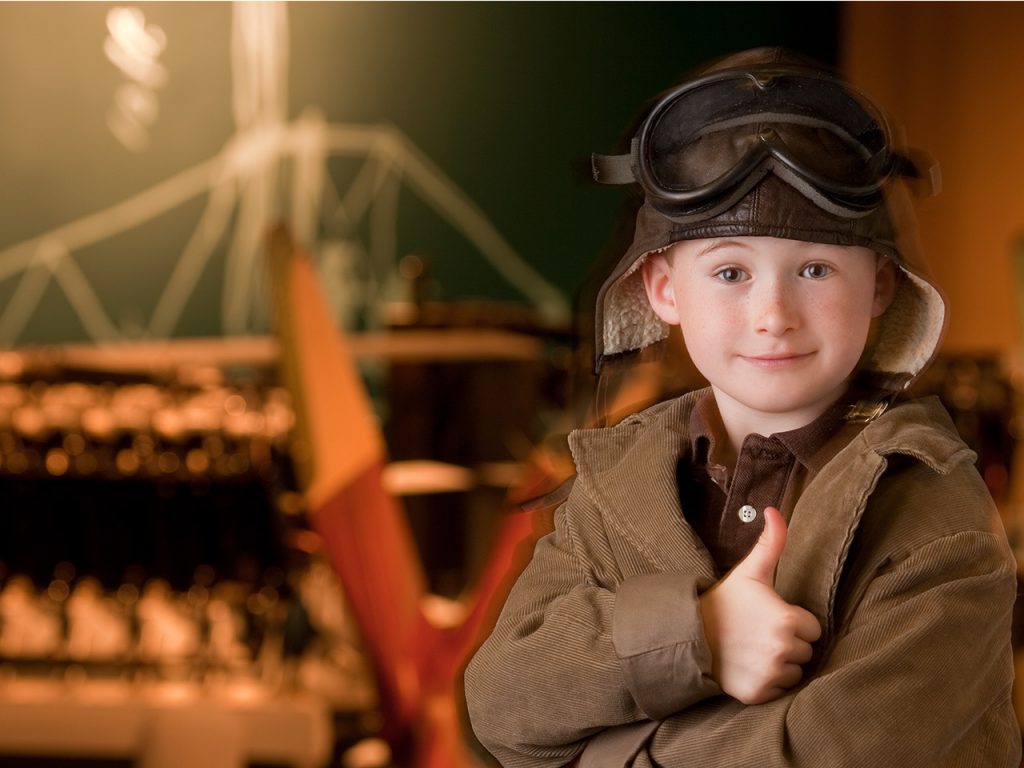 a child dressed as a pilot
