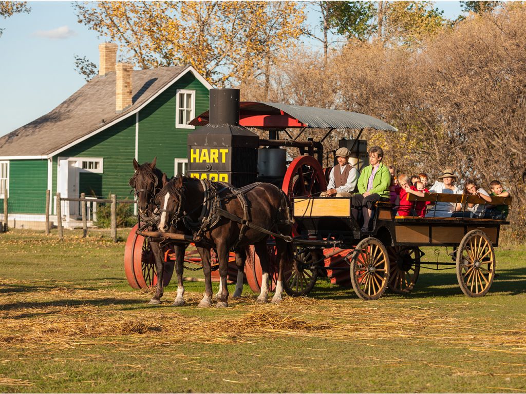 families pulled on horse-drawn wagon
