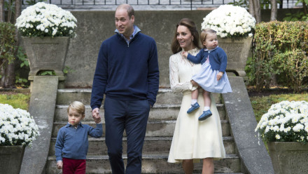Prince William and George, Princess Charlotte and Kate Middleton enter a garden party