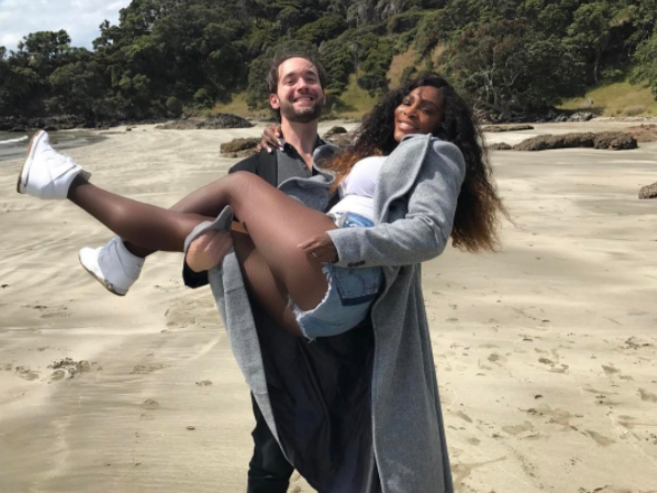 Serena Williams and fiancee Alexis Ohanian on the beach