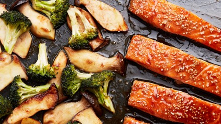 Salmon, broccoli and mushrooms on a sheet pan