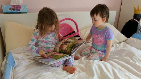 children reading in bed