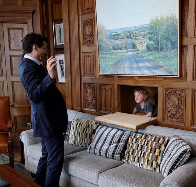 Hadrien and Justin Trudeau playing hide and seek in his office 