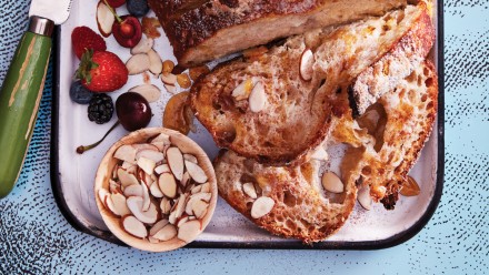 tray of bread with nuts and berries