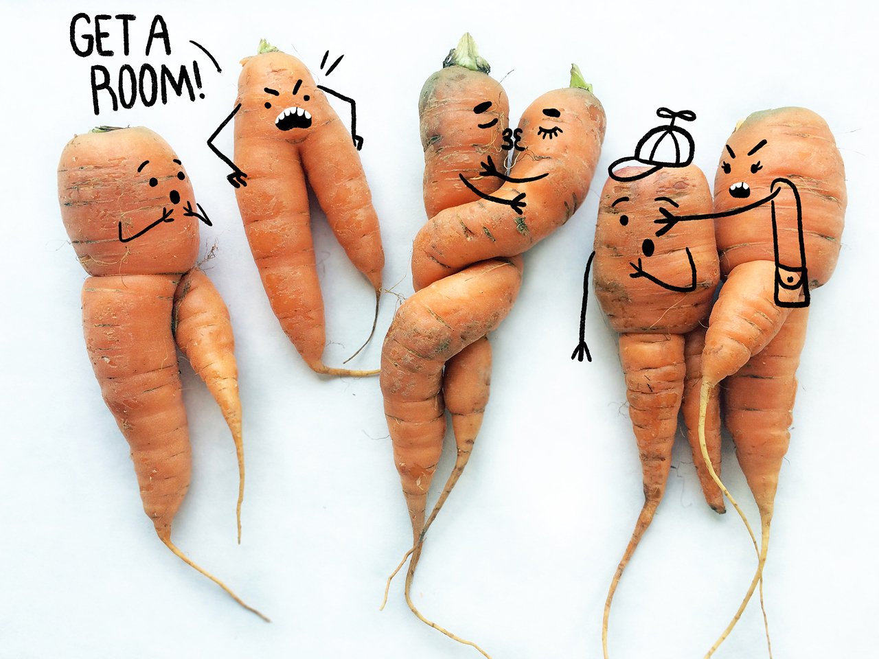 funny looking carrots with faces illustrated on them