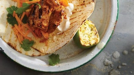 Grilled tortilla with chicken, cheese and sour cream