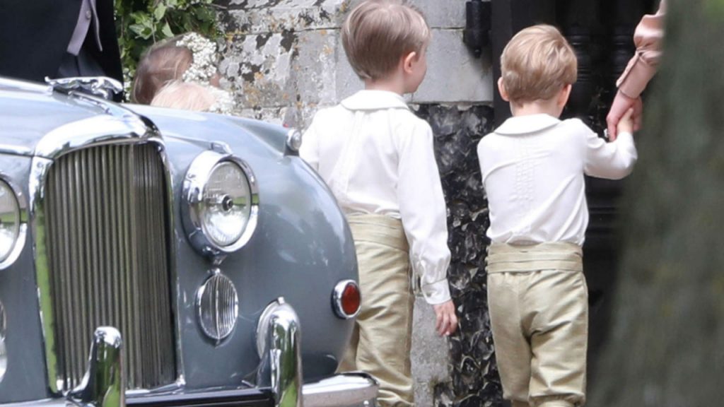The back of Prince George entering Pippa Middleton's wedding