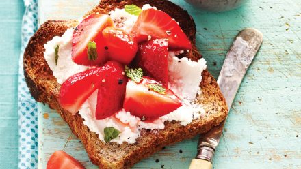 toast with smear of cottage cheese and fresh strawberries