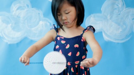 girl playing with fidget toy