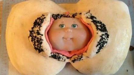 Cabbage Patch doll peeking out of a cake vagina