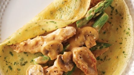 herbed crepe stuffed with saucy chicken, asparagus and mushrooms