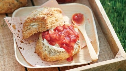 scones with a generous smear of fresh strawberry jam