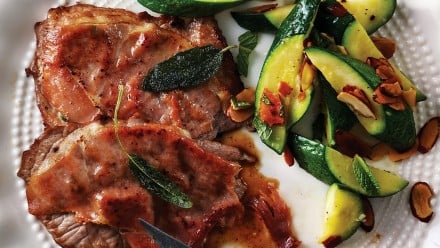 plate of veal cutlets, fresh sage and grilled zucchini