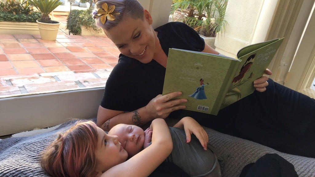 Pink reading a book to her two kids, daughter Willow and son Jameson