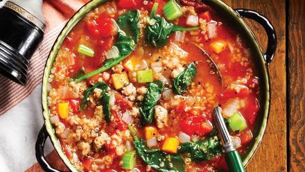 pot of minestrone with quinoa, kale, sausage and veggies