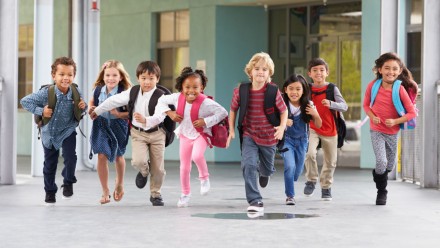 group of kids leaving school
