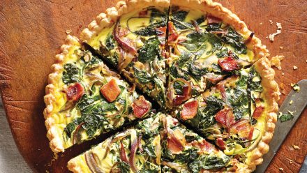 egg tart in a crust with kale, red onion and bacon