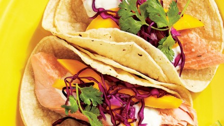 tortilla shells filled with rainbow trout, mango, red cabbage and cilantro